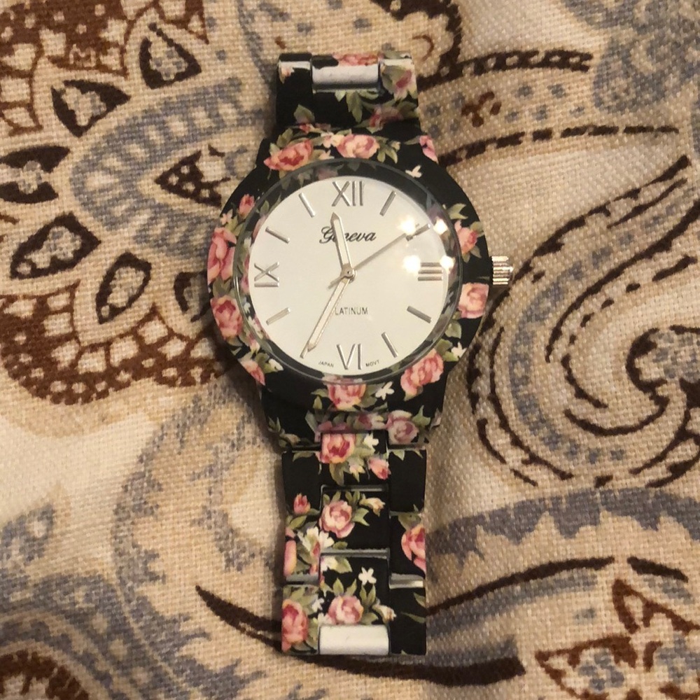 Black and pink floral watch. Worn once.